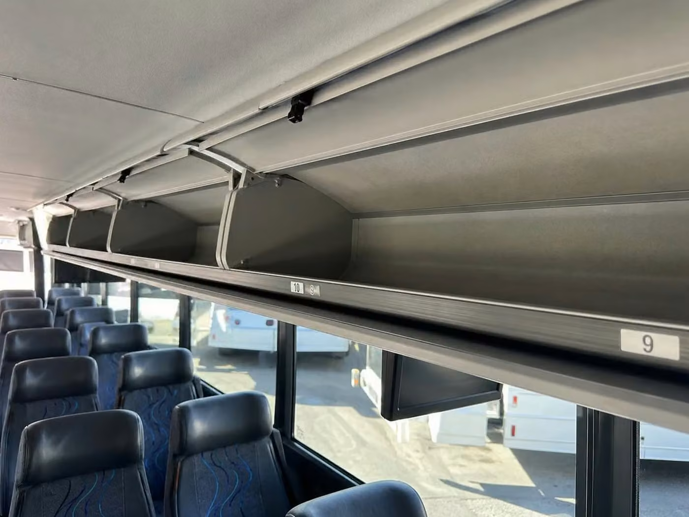 claremont 18 passenger minibus overhead storage