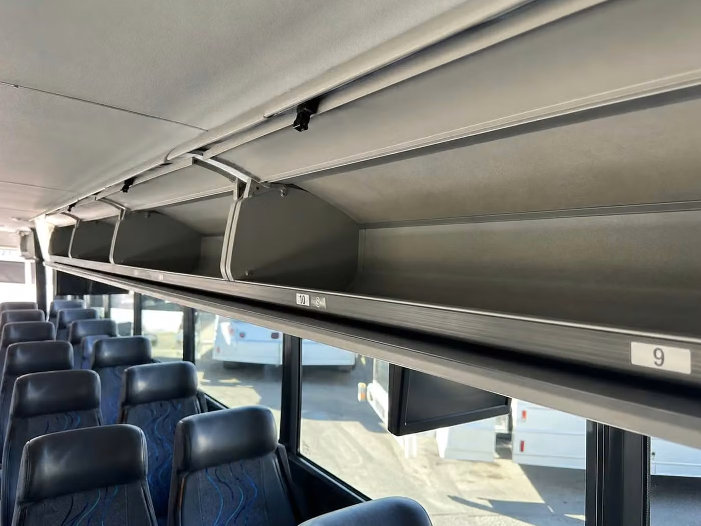 claremont 35 passenger minibus overhead storage