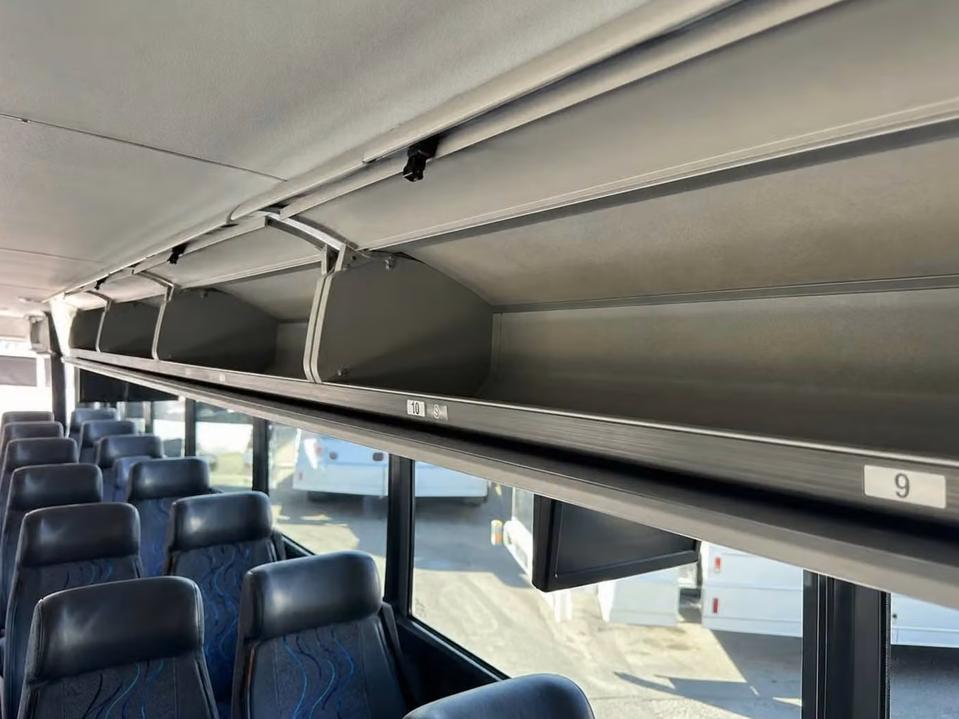 claremont charter bus overhead storage